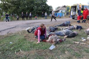 Aftermath of Russian missile strike on supermarket in village of Hroza