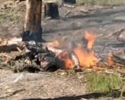 Dead body of Russian soldier burning after drone strike