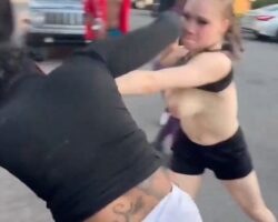 Fight between two women in parking lot