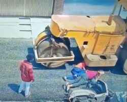 Man and his daughter fell off scooter directly under road roller