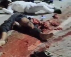 Motorcyclist splattered on asphalt