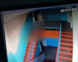 Student falls over railing of school staircase