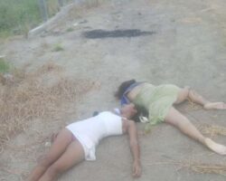 Two young women executed on dirt road