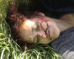 Woman found dead beside railway tracks