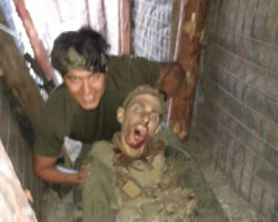 Alleged American soldiers posing with bodies of dead Russian soldiers