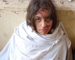 Bloodied female hostage of Hamas