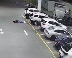 Gunned down in parking lot by several hitmen
