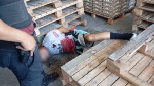 Warehouse security guard overpowered two armed robbers