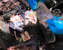 Inspection of dead Russian soldier’s gear