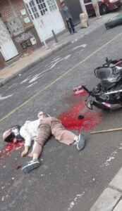 Pregnant motorcycle passenger run over by dump truck