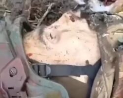 Three fallen Russian soldiers on battlefield