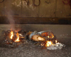 Woman burst into flames on street