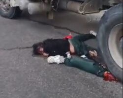City truck runs over couple, killing woman