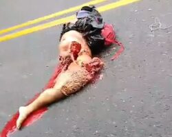 Couple riding motorcycle hit by truck, woman crushed to death