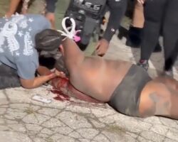 Ghetto lady gets stabbed in neck during street fight
