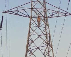 Man found hanged at top of electrical transmission tower