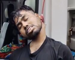 Man found hanging from truck cab
