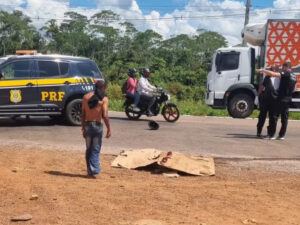 Man mourns over his wife's crushed dead body