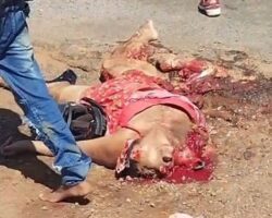 Man mourns over his wife’s crushed dead body