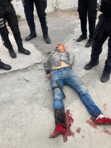 Man shot after attempting to attack police