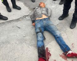 Man shot after attempting to attack police
