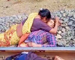 Mother cries over her son split in half by train
