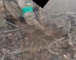 Ukrainian soldier mutilates body of fallen Russian