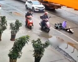 Woman suffers seizure after falling from moped