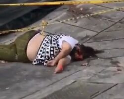 Woman throws herself from fourth floor of apartment building