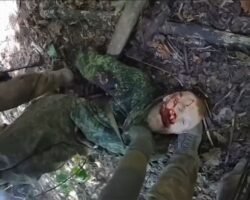 Examination of deceased Russian soldier