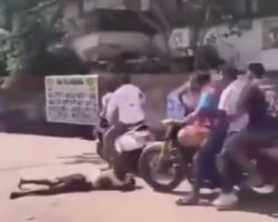 Head run over by motorcycle during street confrontation
