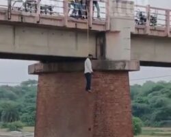 Man found hanged from railway bridge