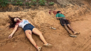 Teen couple found murdered beside dirt road