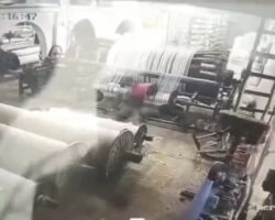 Textile worker trapped in running machine