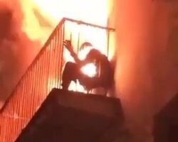 Trapped on balcony of burning apartment