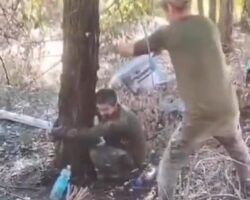 Ukrainian soldier humiliated by being doused with urine