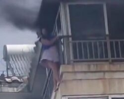 Woman falls from balcony during apartment fire
