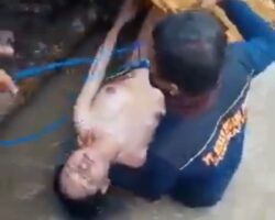 Woman’s naked body discovered in river