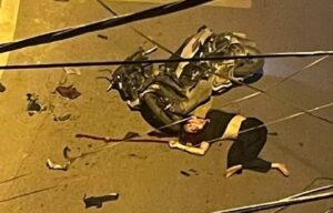 Drunk female motorcyclist crashes into utility pole