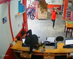 Employee slashes armed robber with machete