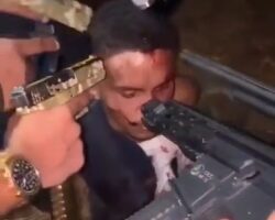 Gang members unload their guns into rival’s head