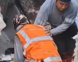 Garbage truck worker dies after bus crashes into vehicle