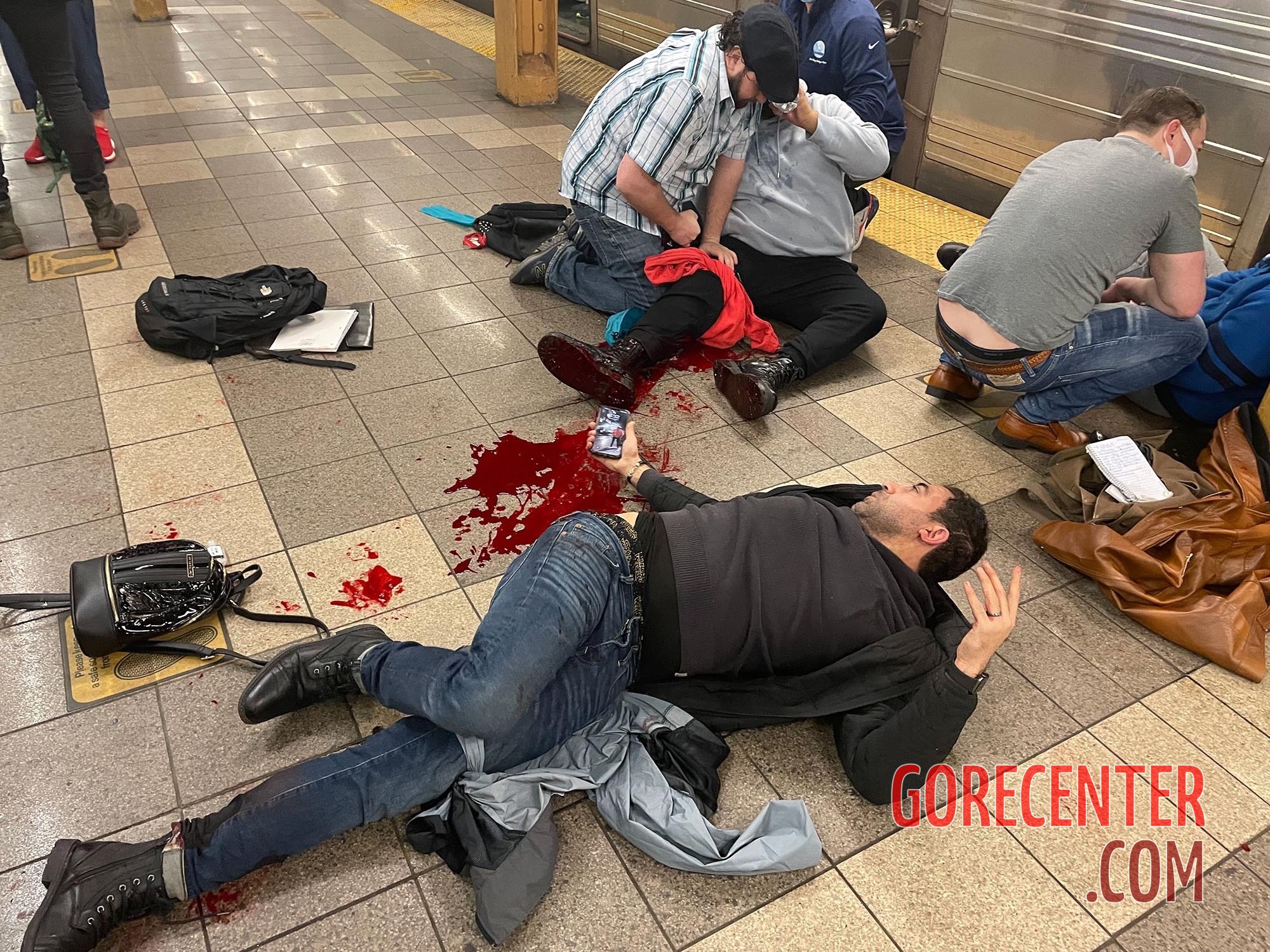 Gunman opens fire on NYC subway train, injuring 10 • GoreCenter