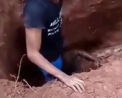 Man forced to dig girlfriend out of shallow grave
