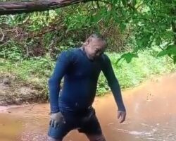Man found hanging from tree branch above river