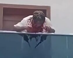 Man slits his own throat on balcony