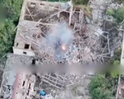 Russian soldier trapped under collapsed building after drone strike