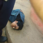 Head of a pretty girl wrapped in a sports bag