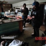 Dead Ukrainian girl with burnt swastika