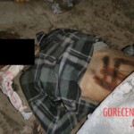 Dead Ukrainian girl with burnt swastika